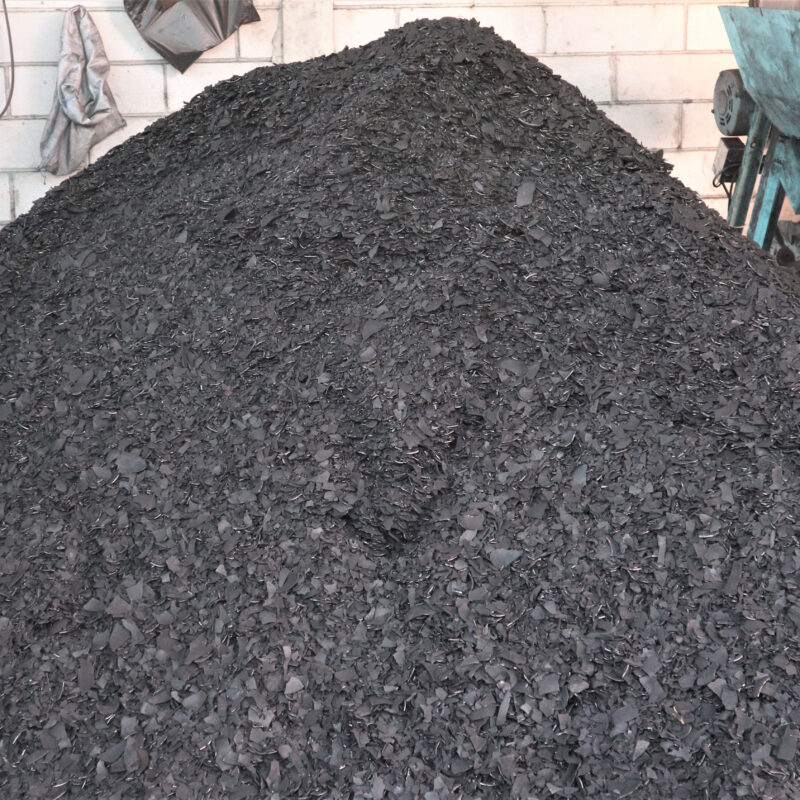 A Pile of Coconut Charcoal Granule In A Warehouse